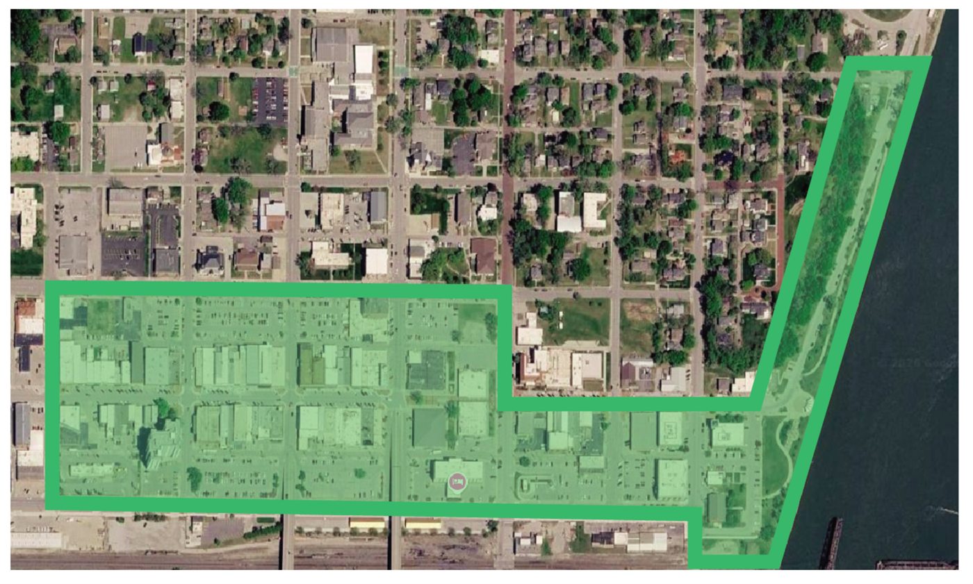 Map of the Locally Atchison Common Consumption Area boundary in downtown Atchison, outlined in green along Commercial Street toward the riverfront